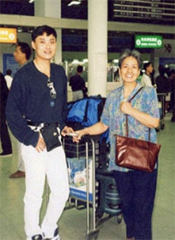 Zhendong and his mother, Yueli Yang, who was an aeronautics scientist in China's space program. Ms. Yang was illegally imprisoned for over a year because she practices Falun Gong.