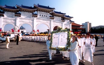 (Pictured: Practitioners in Taiwan hold a parade to remember the practitioners who were killed, undated.)