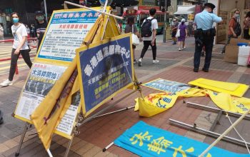 December 2020: Hong Kong booths in tatters, police called on Hu Aimin for assaulting volunteers in Hong Kong.