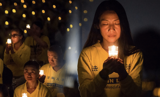 Falun Gong practitioners at the annual candlelight vigil in Washington, D.C. on the anniversary of the persecution in 2017 honoring fellow believers in China who have died during the persecution.