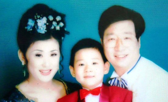 Family photo of Mr. Pang You (right) with his wife and son