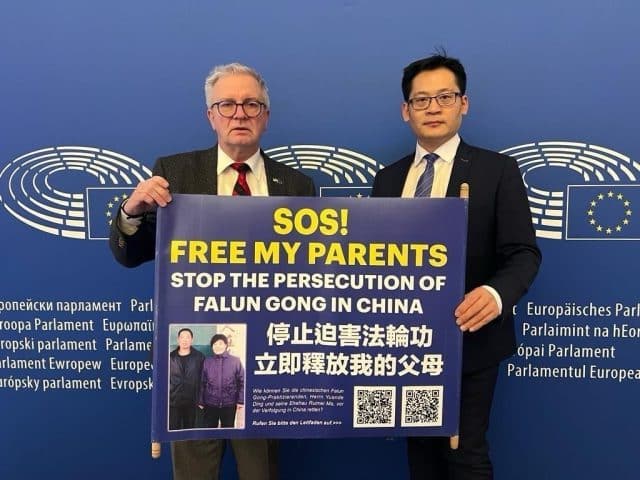 MEP Michael Gahler (L) and Ding Lebin (R) after the debate on the European Parliament's resolution of January 18, 2024 condemning the persecution of Falun Gong in China. 